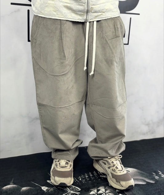 Pantalone a costine fondo largo